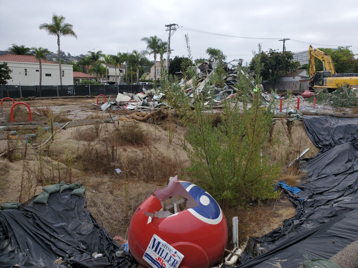 The former 76 gas station at 801 Pearl St. in La Jolla was demolished the morning of Sept. 27.