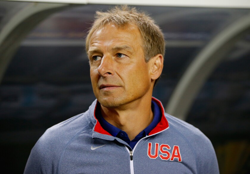 United States Coach Jurgen Klinsmann stands prior to the 2015 CONCACAF Golf Cup Semifinal match between Jamaica and the United States at the Georgia Dome on July 22, 2015.