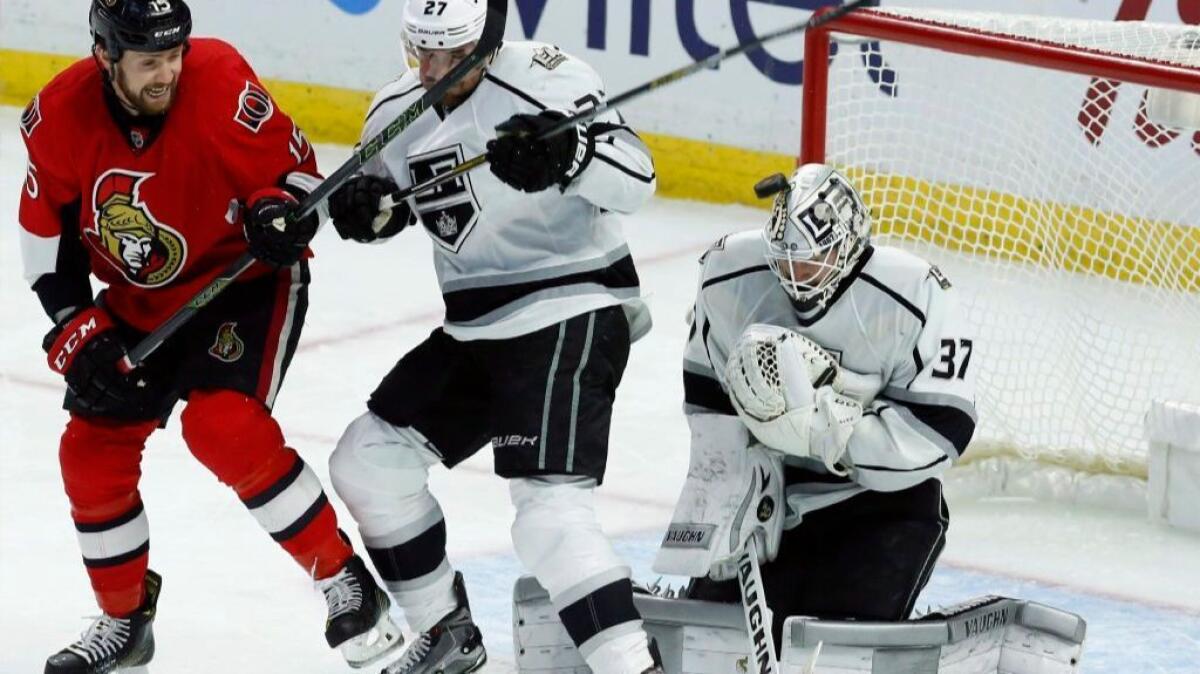 Kings goaltender Josh Zatkoff makes a save during the second period of a game in Ottawa on Nov. 11.