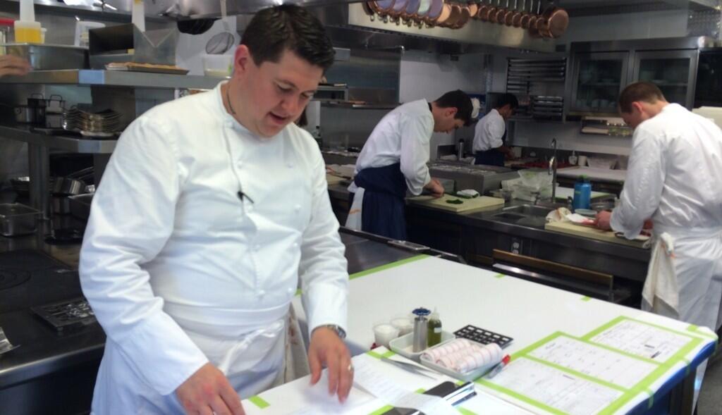 French Laundry chef de cuisine David Breeden works the pass in the temporary kitchen.