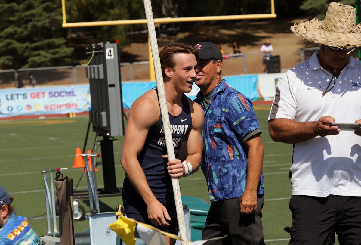 Newport Harbor's Leo Davis is all smiles after qualifying for the state championship in the boys' pole vault on Saturday.