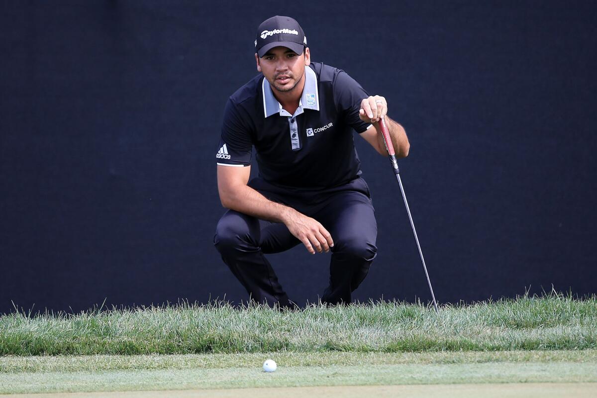 Jason Day lines up a putt on the eighth green during the final round of the Arnold Palmer Invitational on March 20