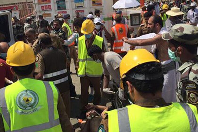 In an image from the Twitter feed of the Saudi civil defense, rescue crews respond to the stampede in Mina, Saudi Arabia.