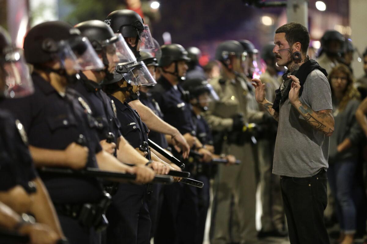 LAPD officers face off with protesters at Sunset and Cahuenga boulevards