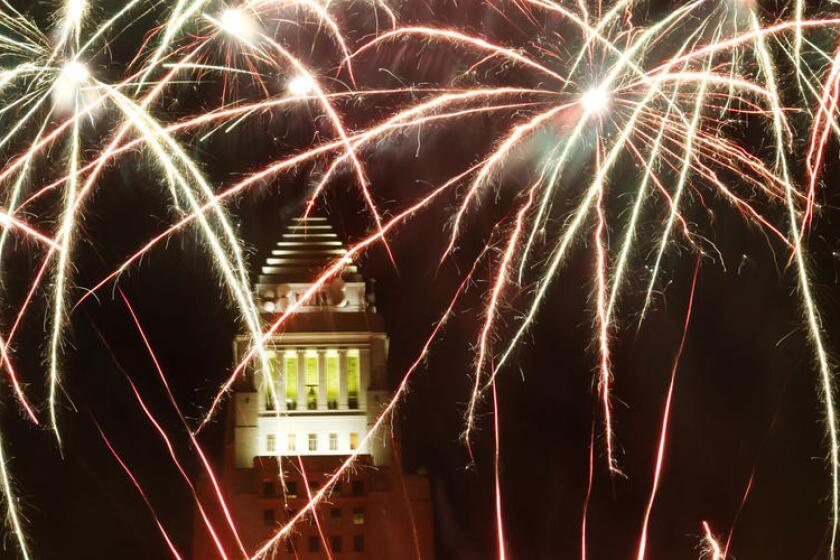 A fireworks and light show at Grand Park near city hall entertained throne of spectators who came out for the 4th of July celebration in 2013.