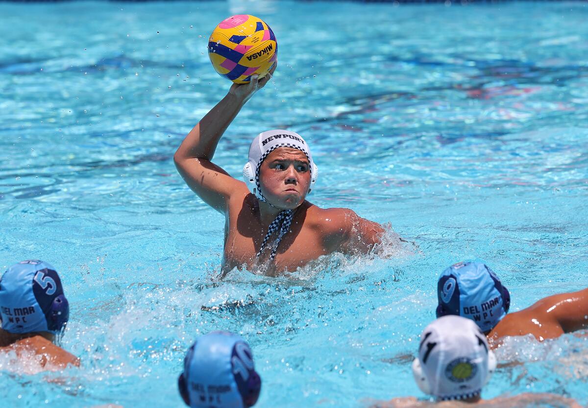 Evan Shackleford (9) of the Newport Beach 12-and-under team fires in a tying goal late in the game against Del Mar.