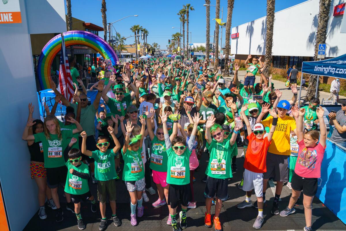 The Kids 1K gives younger community members an opportunity to participate on a shorter race course.