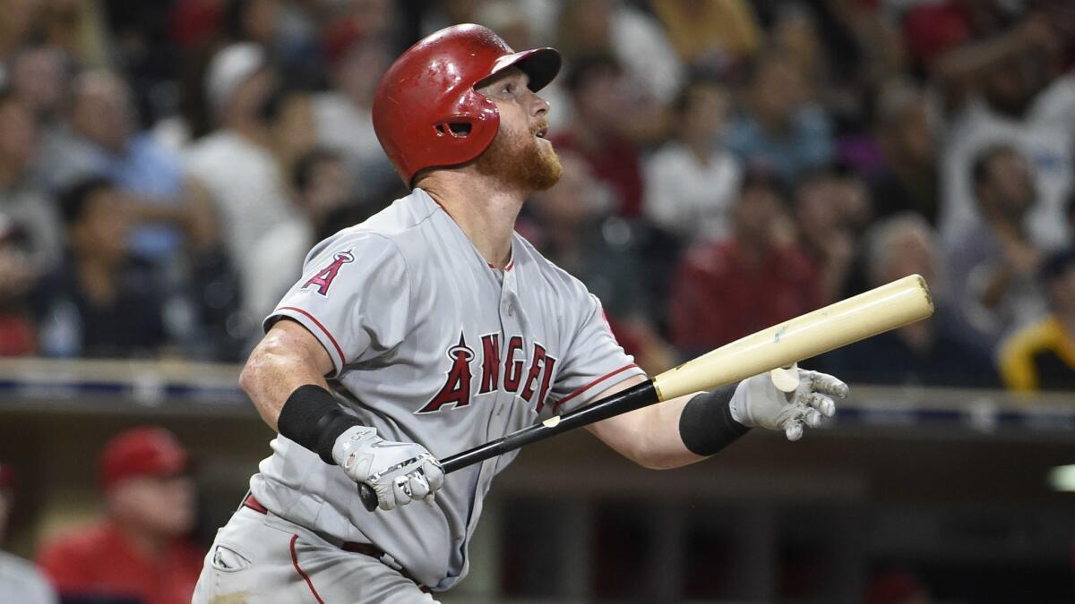 Los Angeles Angels' Kole Calhoun advances to third base on a hit