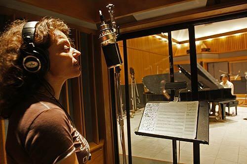 Jazz singer Roberta Gambarini rehearses in Capitol Records' Studio A. Recording engineers fear that plans to build a high-rise next door will affect the acoustics of the echo chambers that are part of the fabled recording studios.