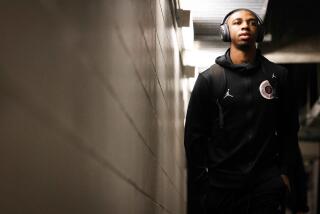 Spokane, WA - March 24: San Diego State guard Lamont Butler (5) walks to the locker room before the Aztecs game against Yale during second round of the NCAA Tournament at Spokane Veterans Memorial Arena on Sunday, March 24, 2024 in Spokane, WA. (Meg McLaughlin / The San Diego Union-Tribune)