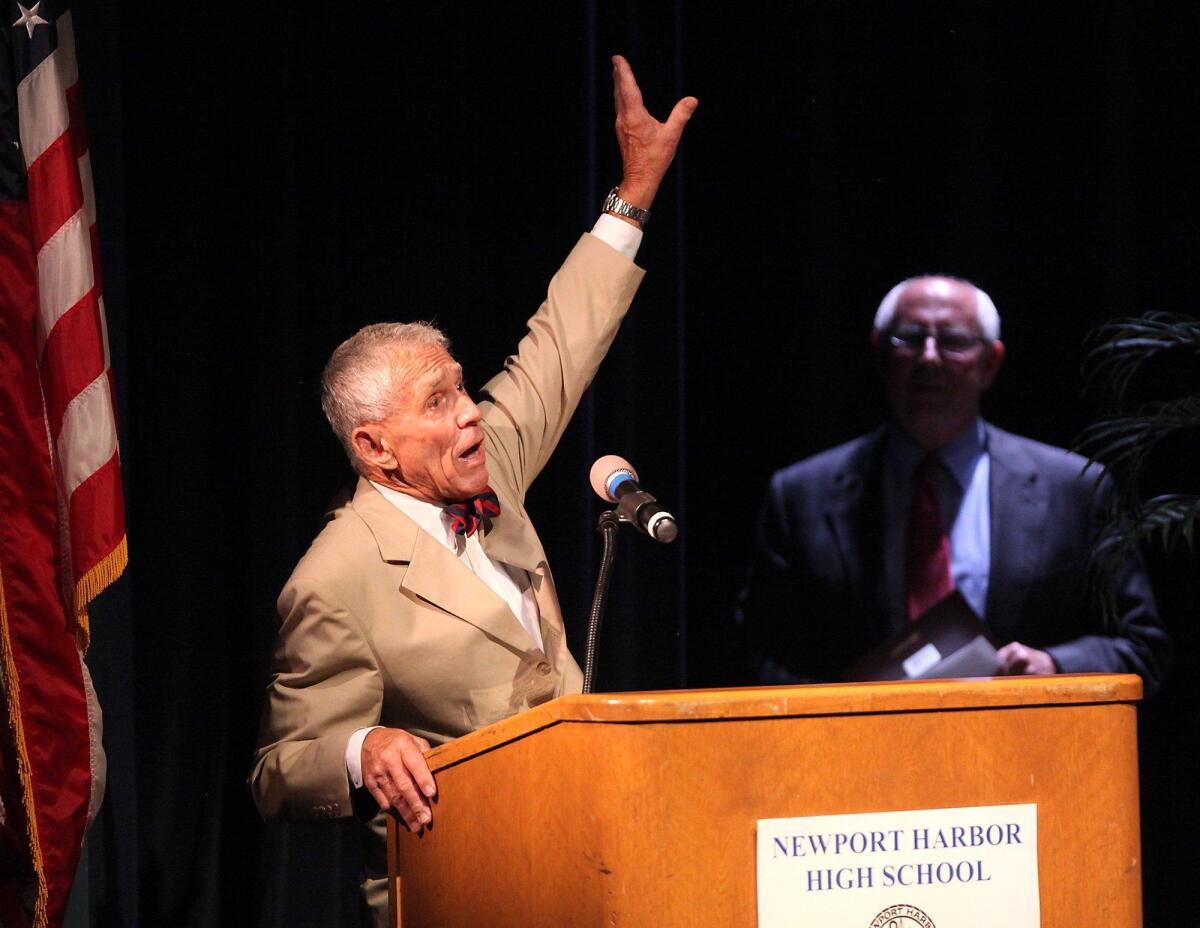 Inductee David Grant shares a story during the third annual Newport Harbor High School Hall of Fame ceremony Wednesday.