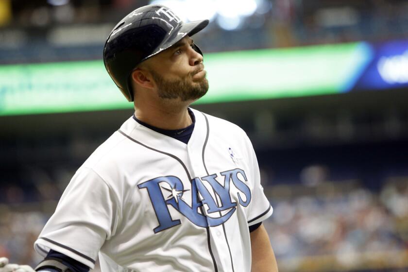 Tampa Bay Rays' Steve Pearce reacts after striking out during the third inning on Sunday.