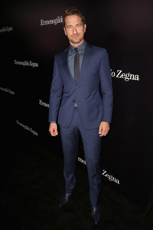 Actor Gerard Butler selected a blue Z Zegna suit accompanied with a blue Z Zegna shirt and tie during the Ermenegildo Zegna Global Store Opening hosted by Gildo Zegna and Stefano Pilati at Ermenegildo Zegna Boutique in Beverly Hills.