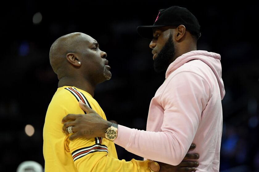 LOS ANGELES, CALIFORNIA - SEPTEMBER 01: LeBron James greets head coach Gary Payton of the 3 Headed Monsters after the game during the BIG3 Championship at Staples Center on September 01, 2019 in Los Angeles, California. (Photo by Harry How/BIG3 via Getty Images)