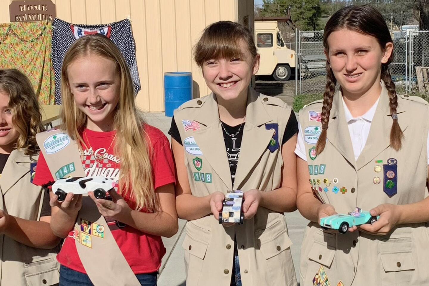 Girls at Pinewood Derby: The new face of Boy Scouting