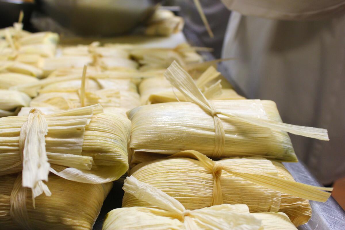 A Los Angeles County Sheriff's Department veteran has been placed on leave after he was found drunk in a tamale vendor's car and was disarmed by bystanders, officials said.