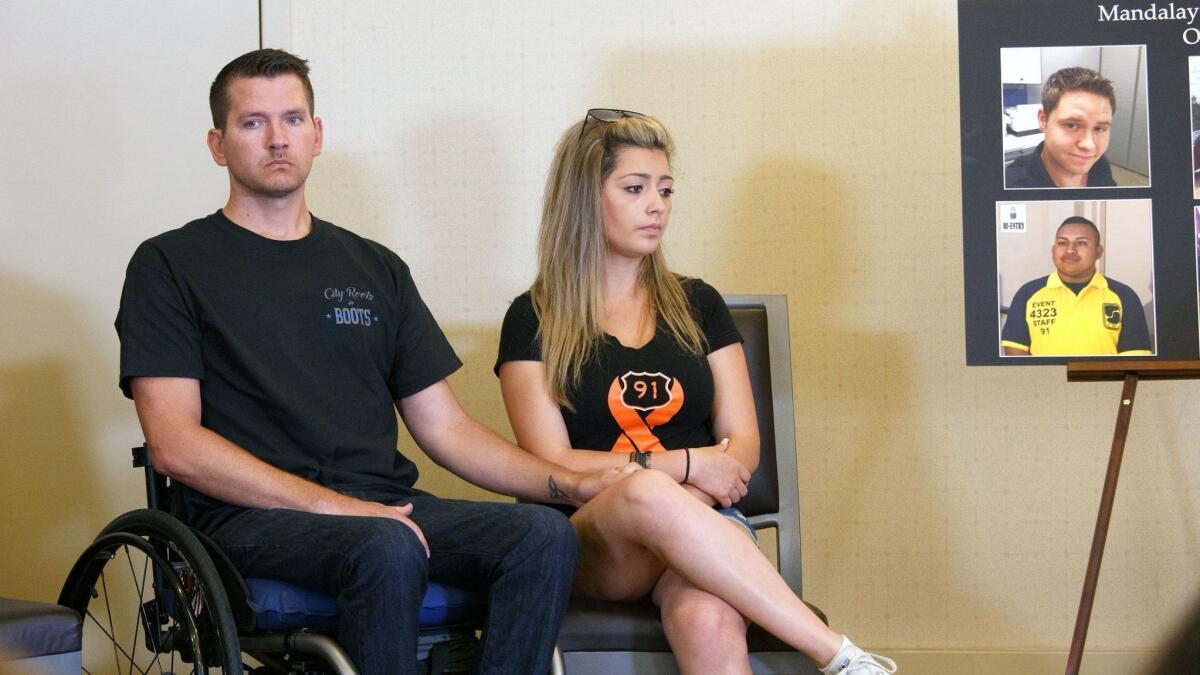 Jason McMillan, who was paralyzed in the October 2017 mass shooting in Las Vegas, and fiancee Fiorella Gaete at a news conference this week in Newport Beach.