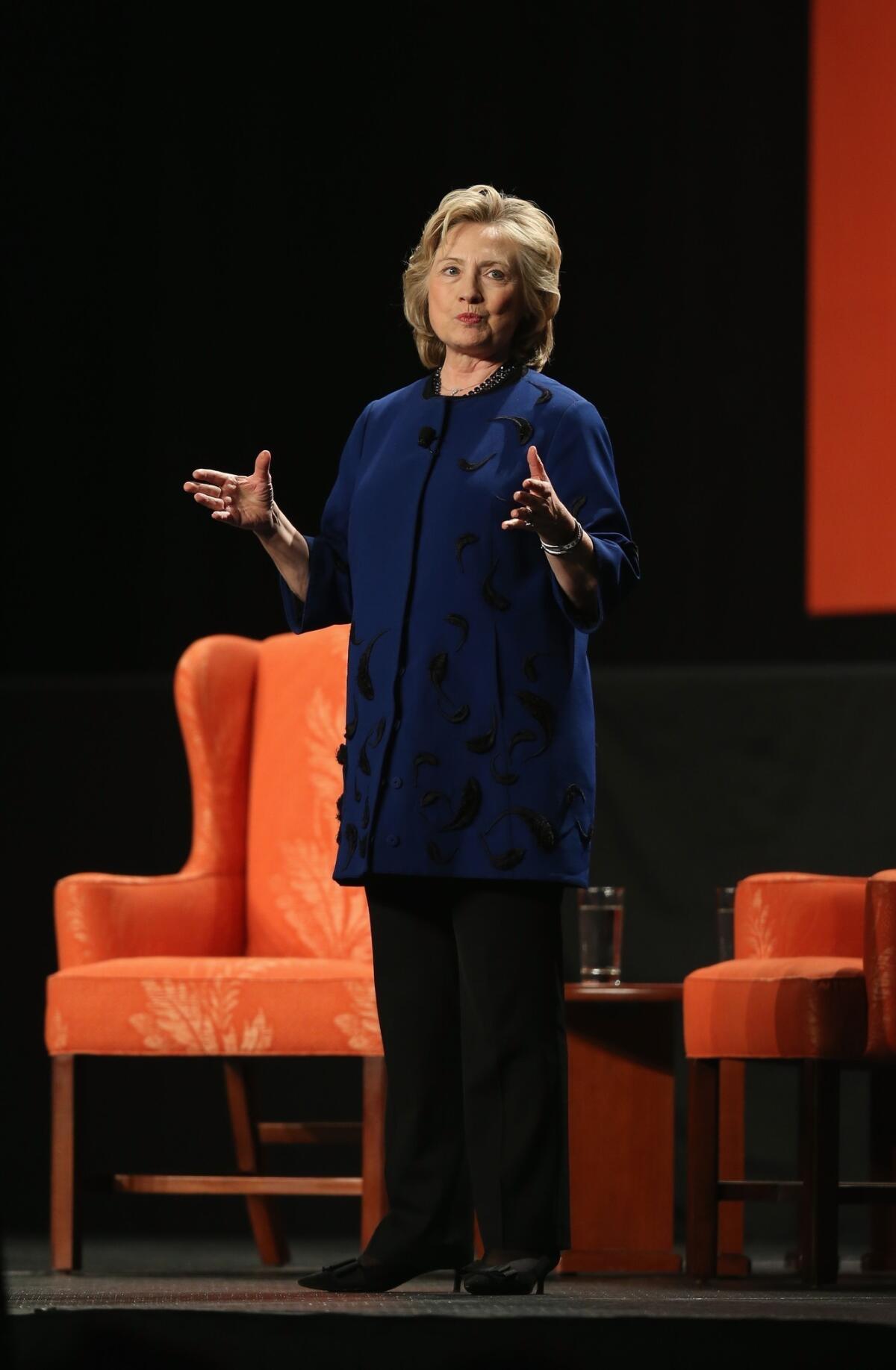 At a Wednesday night stop in Coral Gables, Fla., Hillary Rodham Clinton revealed nothing about her future plans. But she did offer a glimpse of some possible themes in a 2016 run for president.