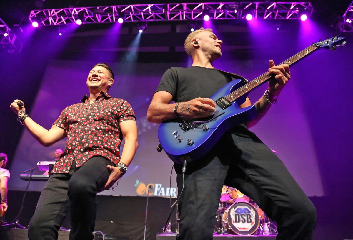 Lead vocalist Juan Del Castillo and guitarist Miles Schon of Journey tribute band DSB play to a sold-out show in the Hangar.