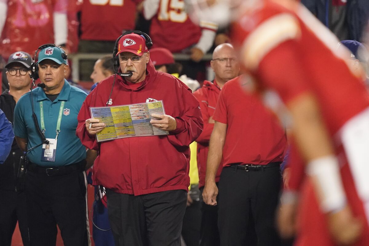 Kansas City Chiefs head coach Andy Reid watches from the sidelines during the first half of an NFL football game against the Buffalo Bills Sunday, Oct. 10, 2021, in Kansas City, Mo. (AP Photo/Charlie Riedel)