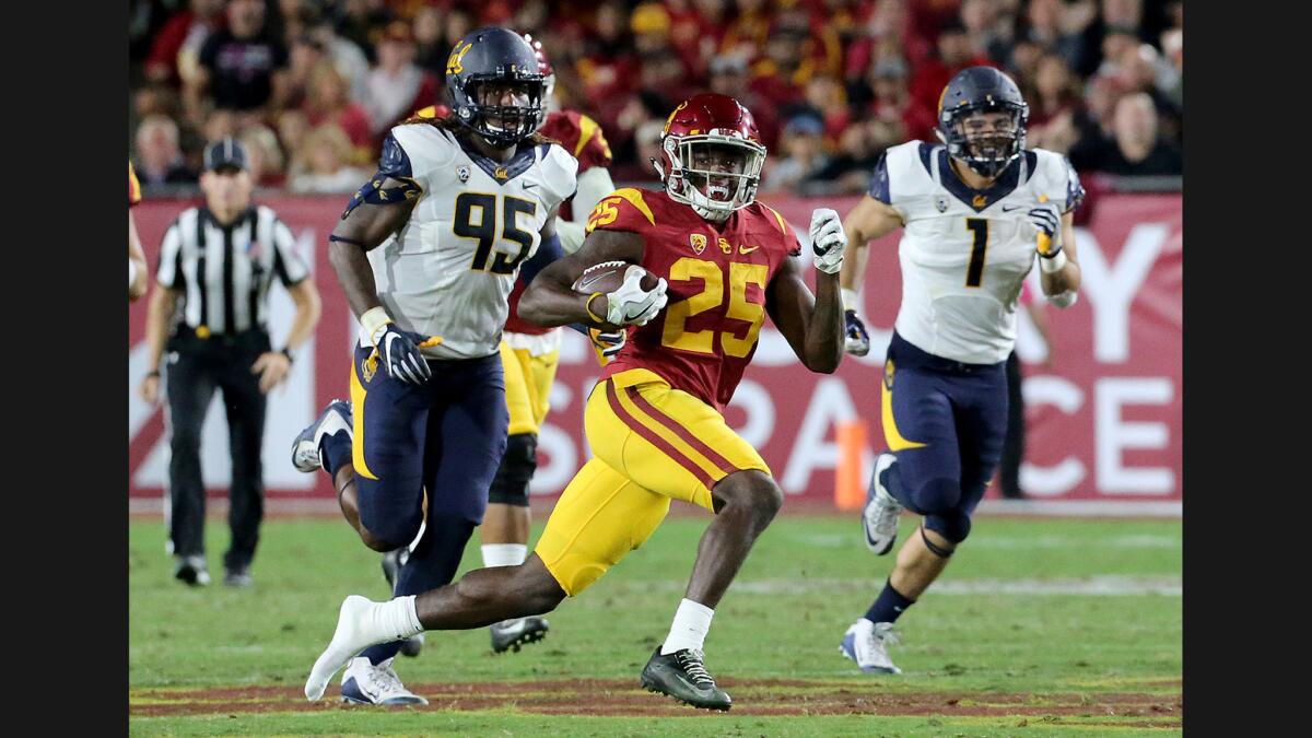 USC running back Ronald Jones II loses a shoe on a run against California during the second quarter of a game on Oct. 27.