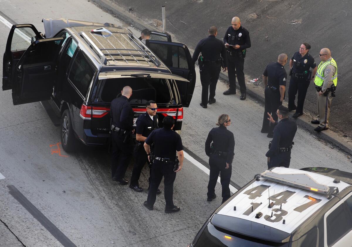 An investigation is underway after an SUV that was carrying a body in a casket and was stolen from a Pasadena church parking lot crashed on the 110 Freeway on Feb. 27 during a police pursuit.