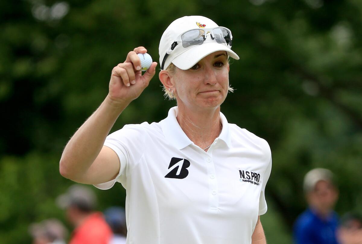 Kakrrie Webb acknowledges the crowd after making a birdie at No. 17 during the first round of the U.S. Women's Open on Thursday.