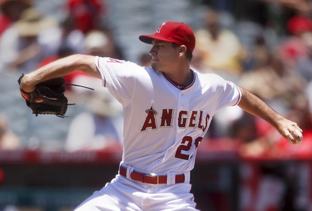 Angel rookie pitcher Andrew Heaney faces the Houston Astros during the first inning of a game Wednesday at Angel Stadium