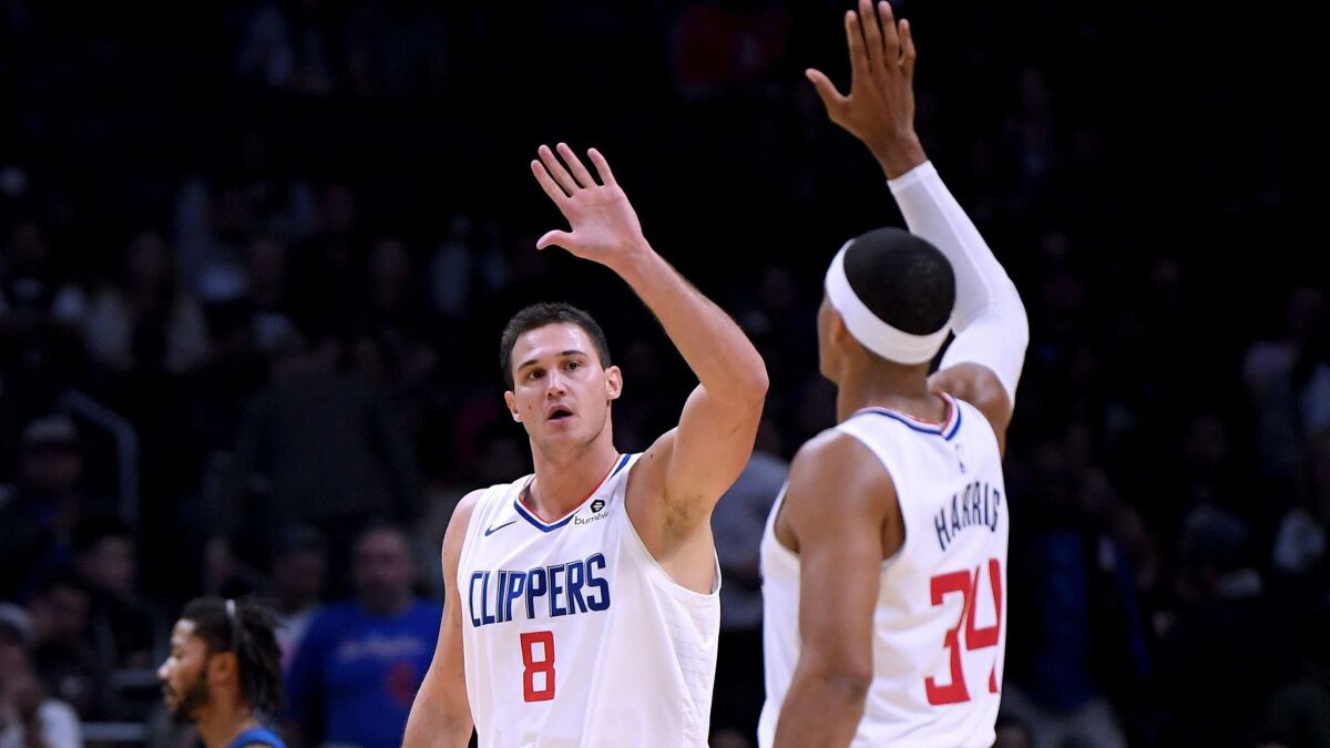 Clippers teammates Danilo Gallinari (8) and Tobias Harris form one of the highest-scoring forward tandems in the NBA.