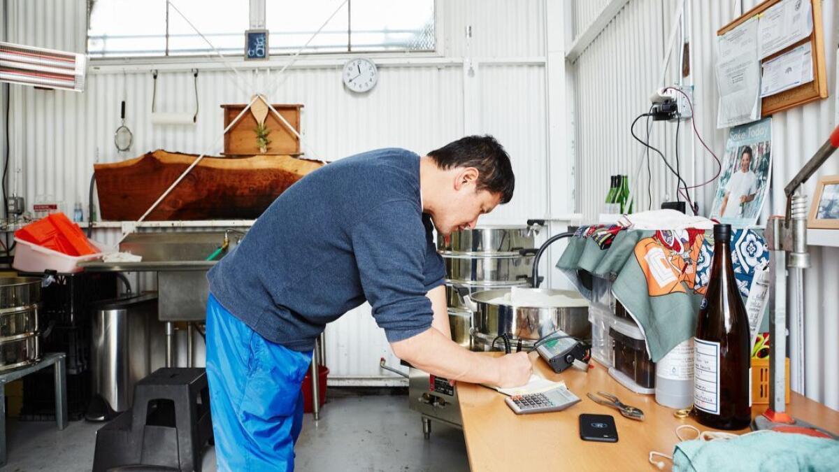 Yoshihiro Sako’s mission with Den is similar to that of many upstart wineries in California and beyond: to create a hyper-local, small-batch drink that speaks to the place it was made.