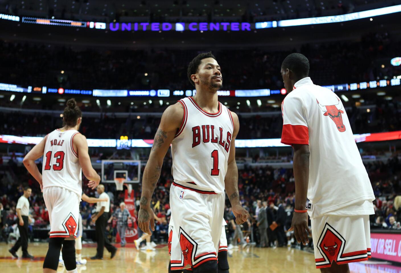 Derrick Rose walks off the floor after losing to the Golden State Warriors.
