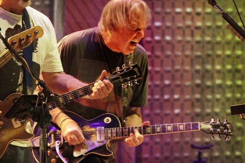 Singer-songwriter Neil Young, shown performing with Crazy Horse in 2012 at the Hollywood Bowl, has elaborated on his statement explaining why he objected to Donald Trump using his song "Rockin' in the Free World" in a presidential bid.