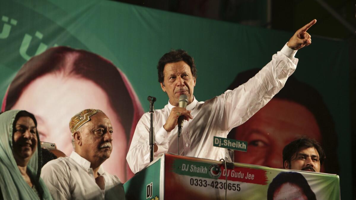Pakistani politician Imran Khan addresses his supporters during a campaign in Lahore on July 23, 2018.