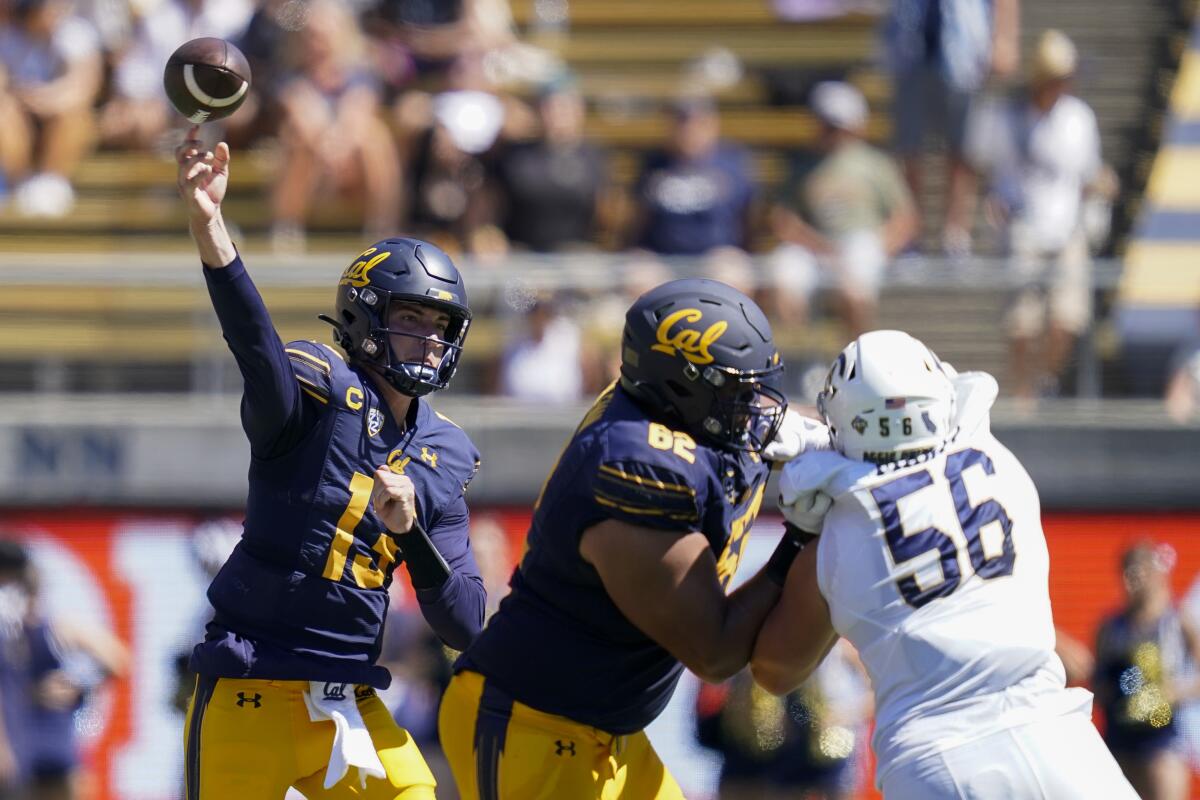 California quarterback Jack Plummer (13) throws a pass against UC Davis during the first half of an NCAA college football game in Berkeley, Calif., Saturday, Sept. 3, 2022. (AP Photo/Godofredo A. Vásquez)
