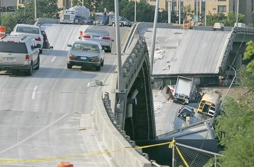 Numerous cars remained on the toppled bridge, including a school bus on the lower level on Aug. 2, 2007.