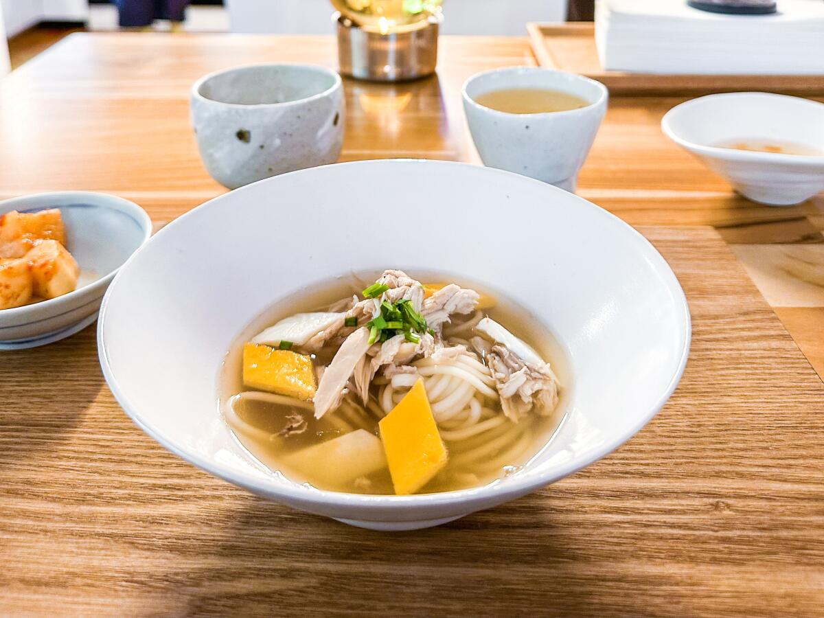 Chicken soup with radish kimchi at Chae, a six-seat restaurant run by Jung Eun Chae in Cockatoo, Victoria, Australia