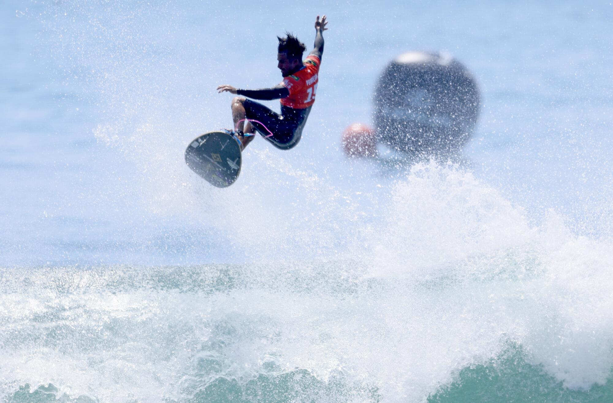 Brazilian Ítalo Ferreira gets big air during the Lexus WSL Finals.