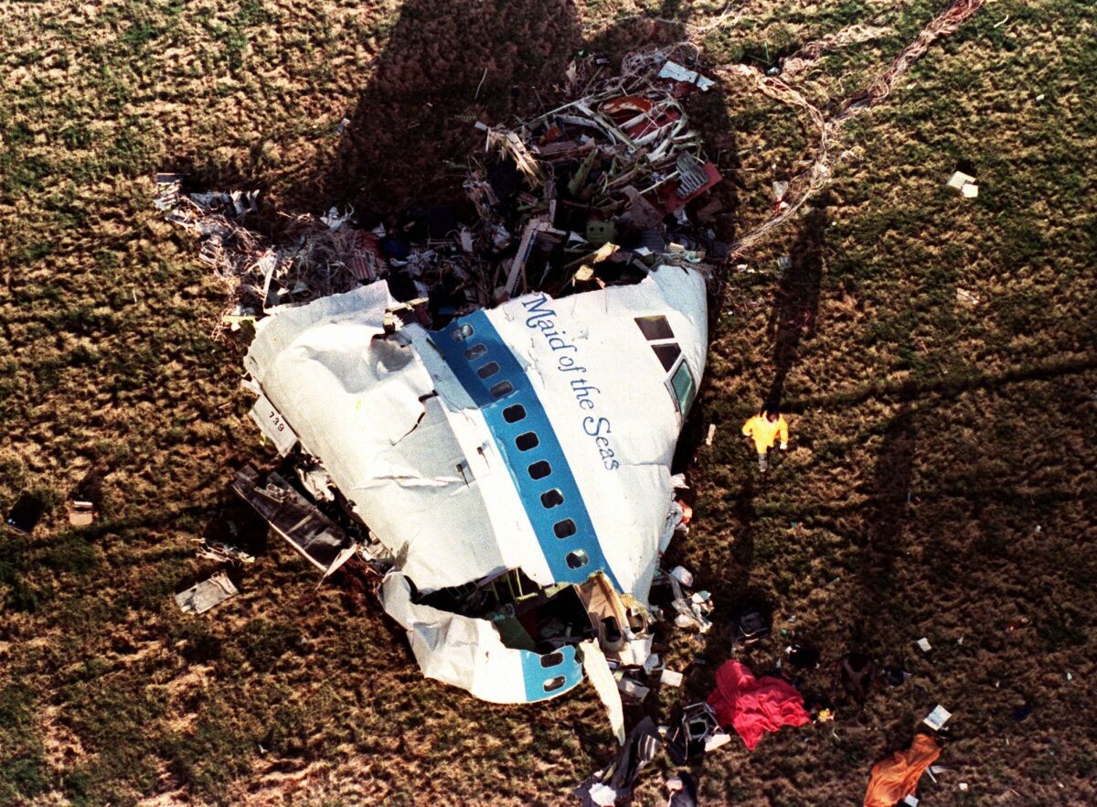 A large piece of the nose of Pan Am 103 in a field in Lockerbie, Scotland, after a bomb on the plane exploded