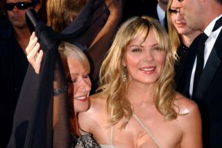 Helen Mirren and Kim Cattrall during The 55th Annual Primetime Emmy Awards