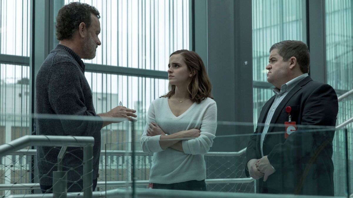 This image released by STX Entertainment shows Tom Hanks, Emma Watson and Patton Oswalt in a scene from "The Circle."