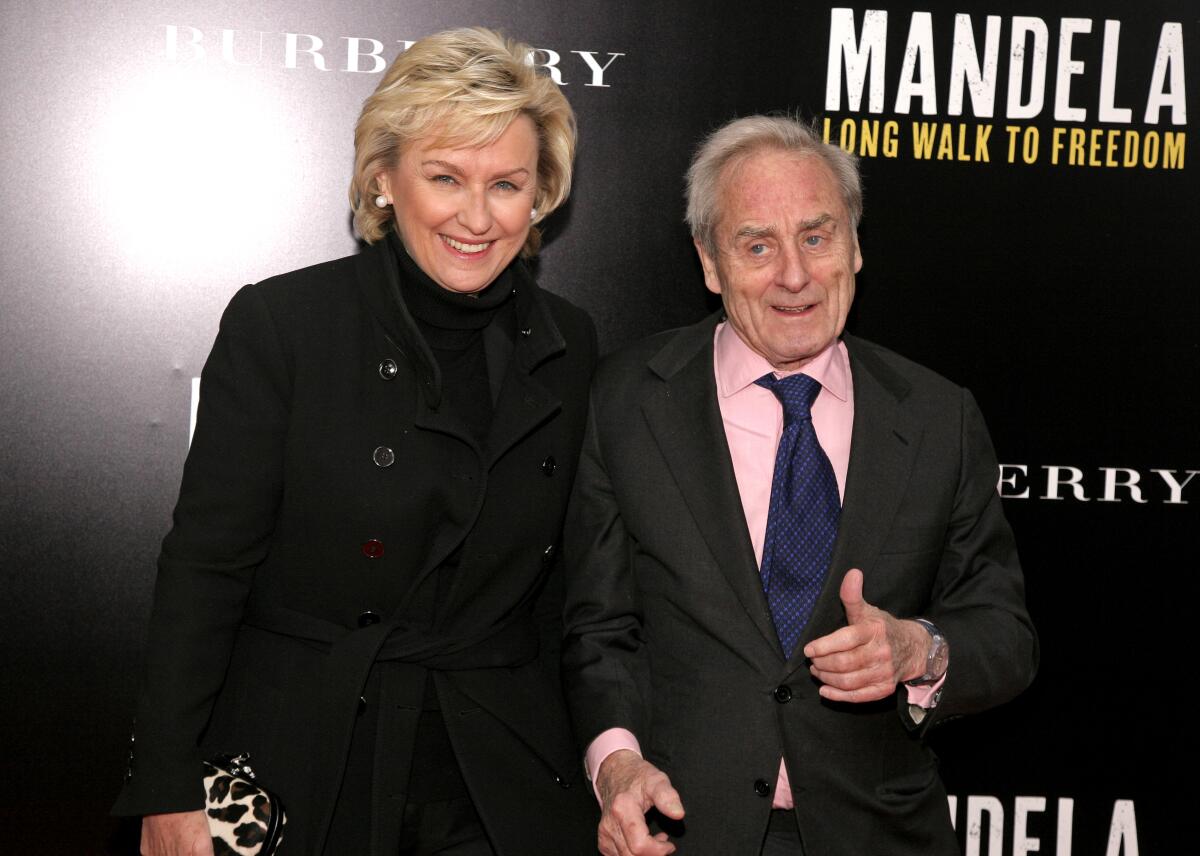 Tina Brown and husband Harold Evans on a red carpet in 2013.