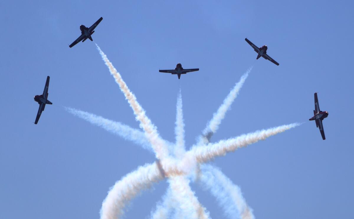 The Canadian Forces Snowbirds criss-cross each other at the 2019 airshow.