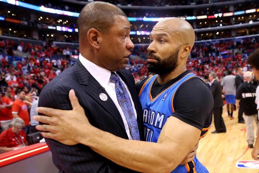 Derek Fisher, right, will not be joining the Clippers' Doc Rivers in the fraternity of L.A. coaches in the NBA.