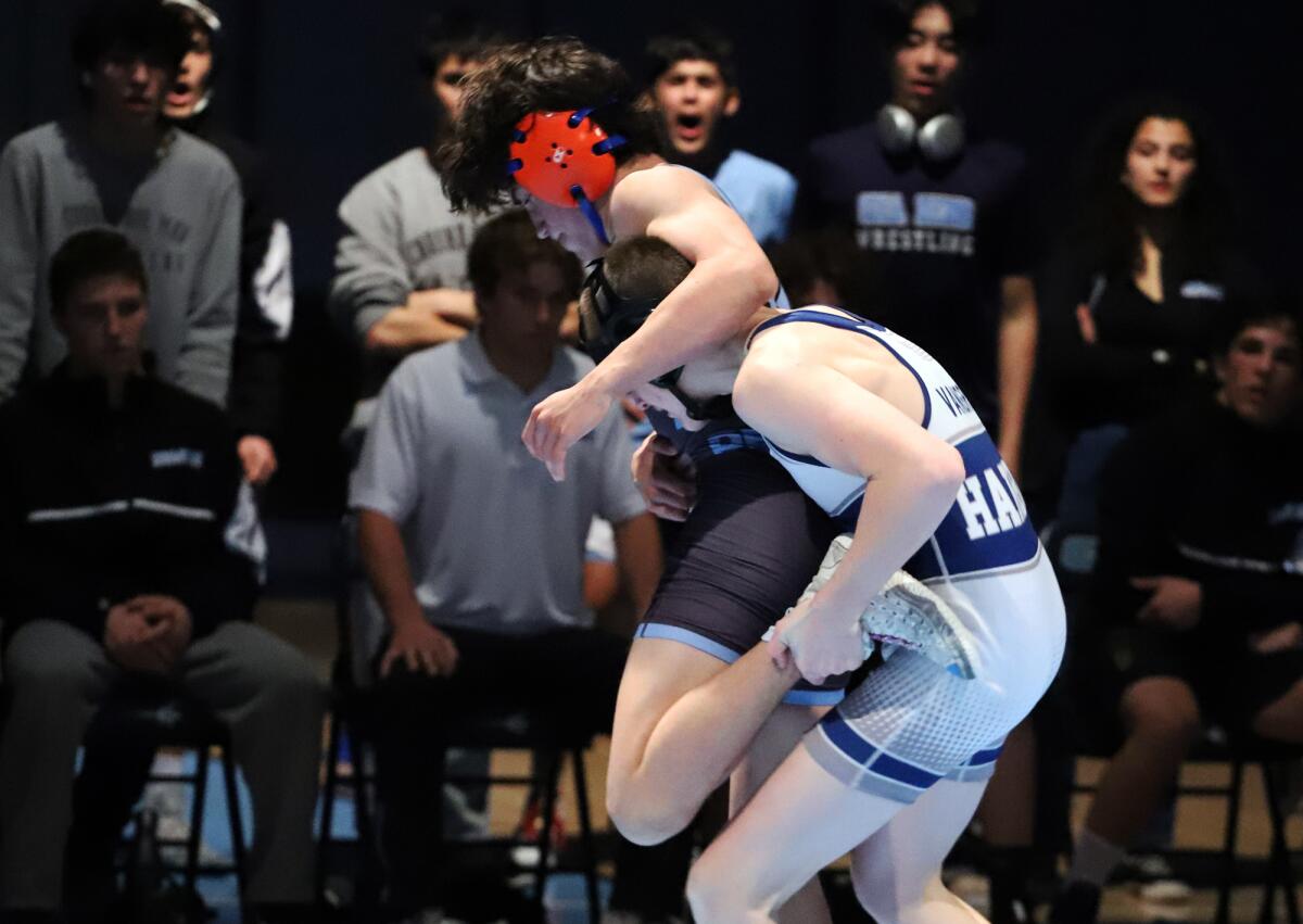 Newport Harbor's Micah Van Grol and Corona del Mar's Graham Desantis compete in the Battle of the Bay.