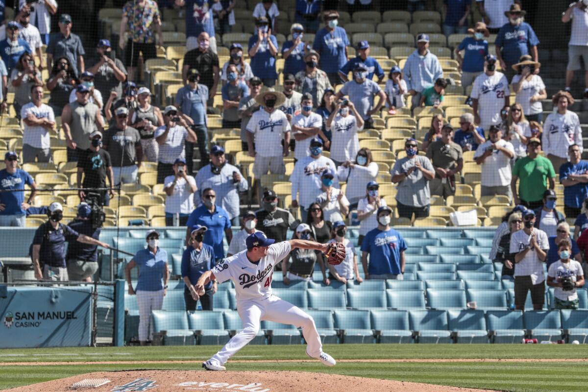 Dodgers reliever Corey Knebel delivers the final pitch of the game as he saves a 1-0 win over the Nationals on April 9.