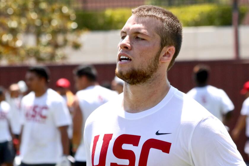 Roseville tight end Jimmy Jaggers performs at a USC football summer camp in June.