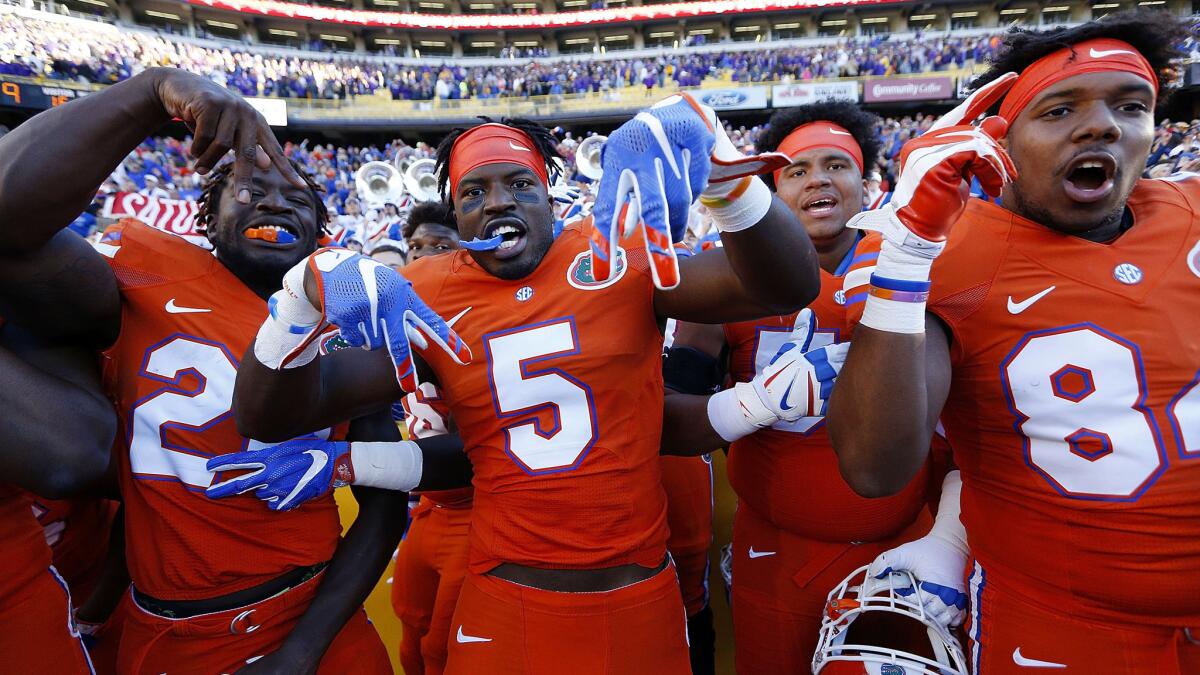 Florida players celebrate after defeating Louisiana State in Baton Rouge on Saturday.