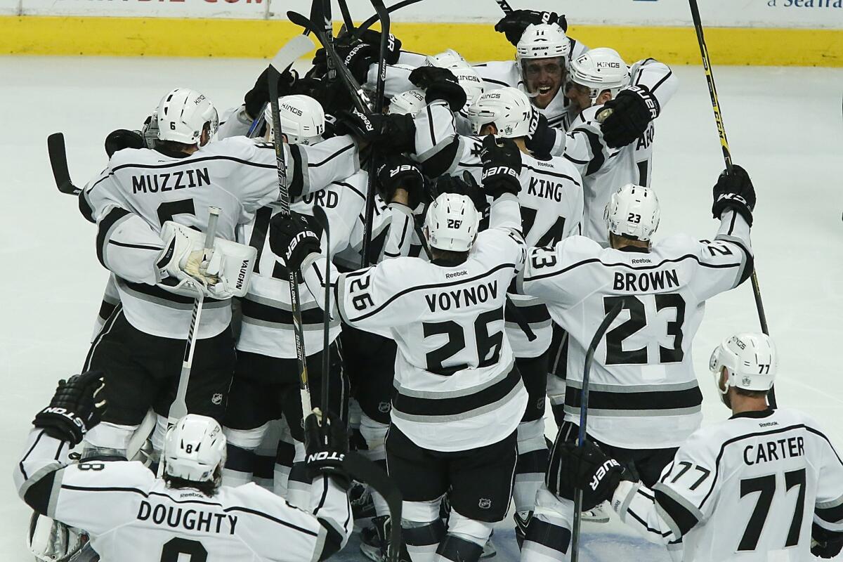 The Kings celebrate following their overtime win over the Chicago Blackhawks in Game 7 of the Western Conference finals. Defenseman Alec Martinez scored the winning goal in the extra frame to push the Kings to their second Stanley Cup Final appearance in three years.