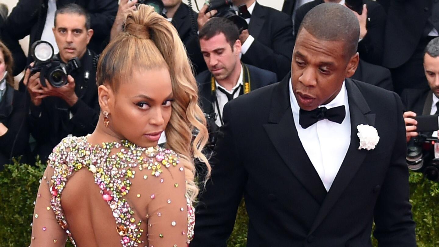 Beyonce had it going on in Givenchy and didn't hubby Jay Z know it at the 2015 Met Gala, themed "China: Through the Looking Glass."