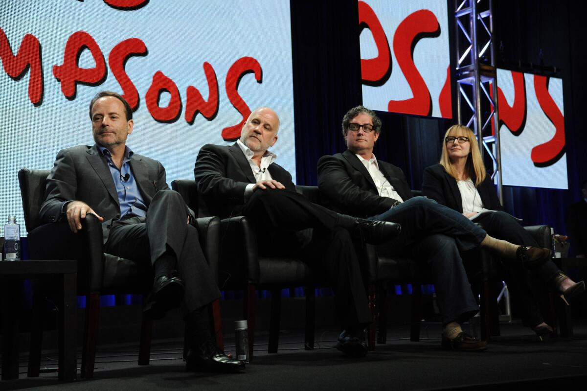 From left, John Landgraf, CEO of FX Networks and FX Productions; Chuck Saftler, president of Program Strategy and COO, FX Networks; Al Jean, executive producer; and Stephanie Gibbons, president, marketing and on-air promotions, FX Networks, speak during "The Simpsons" panel.